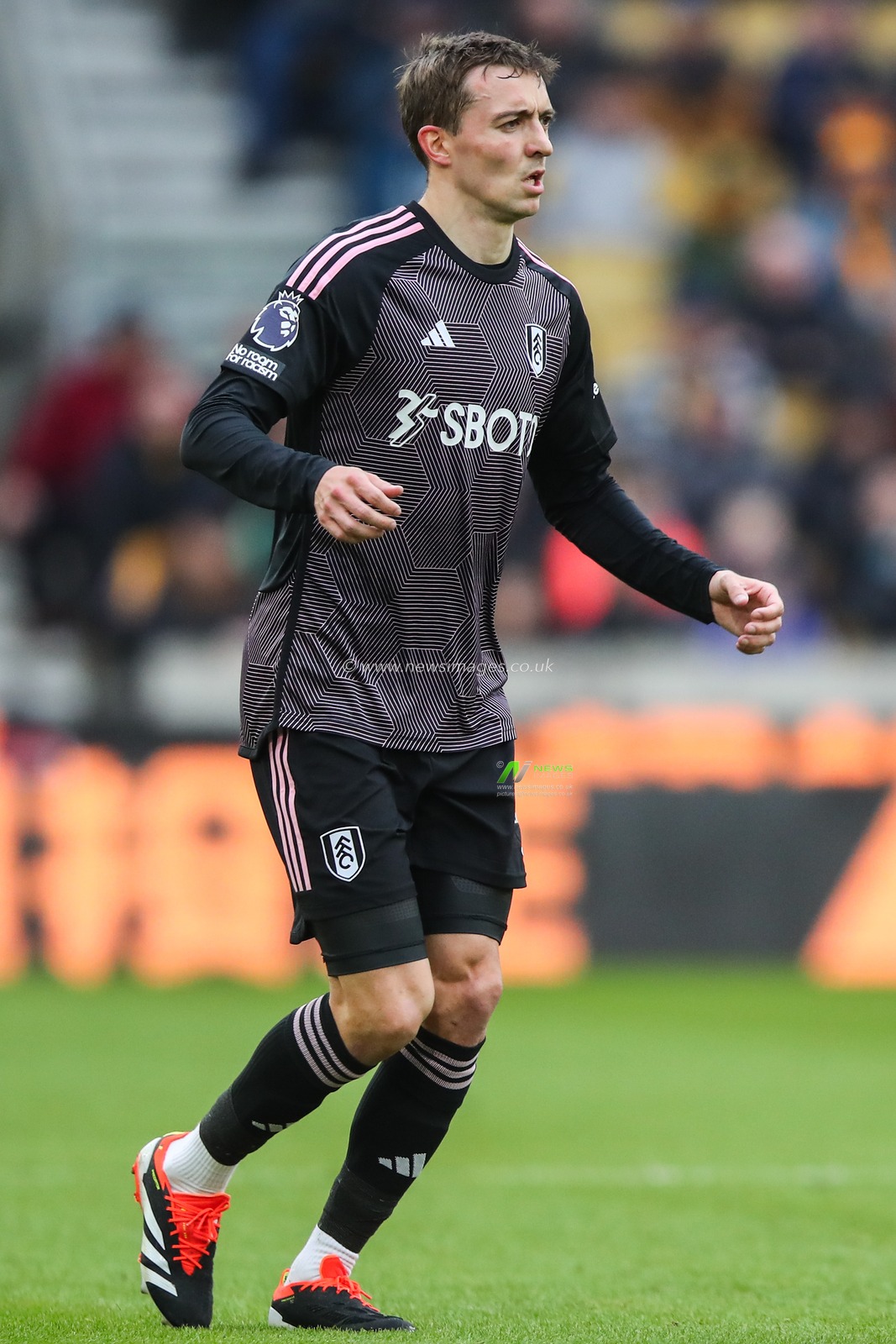 Timothy Castagne of Fulham in action during the Premier League match Wolverhampton Wanderers vs Fulham at Molineux, Wolverhampton, United Kingdom, 9th March 2024

(Photo by Gareth Evans/News Images)