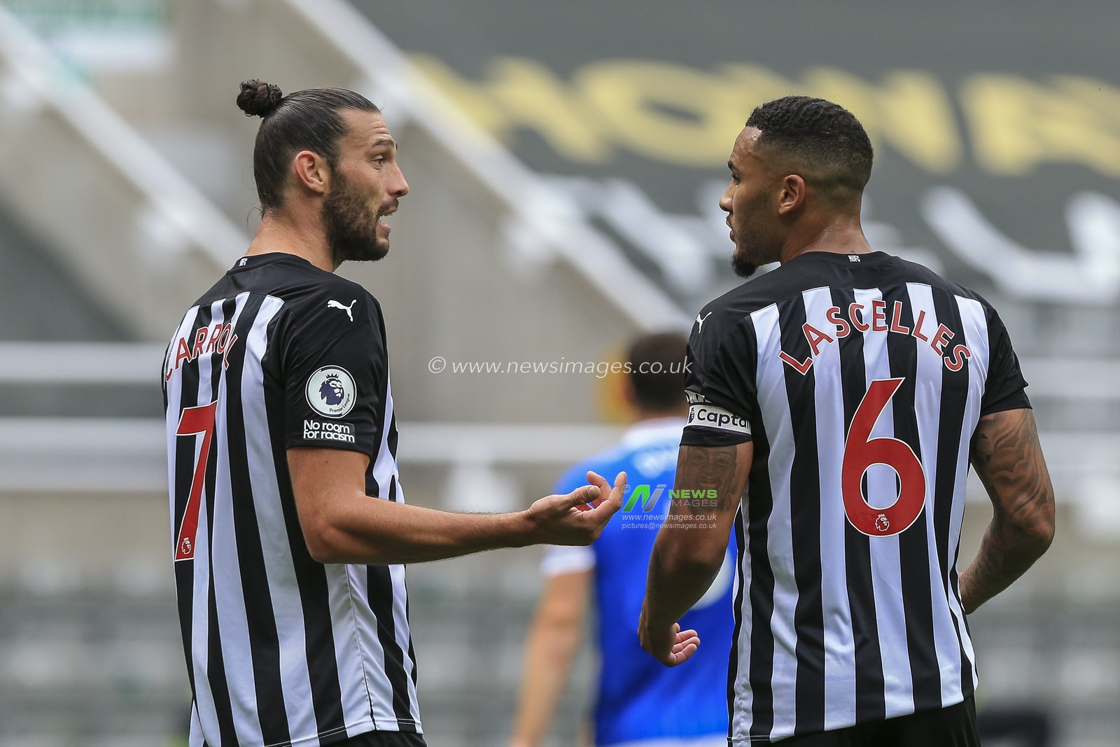 Andy Carroll (7) of Newcastle United and Jamaal Lascelles (6) of Newcastle United in discussion