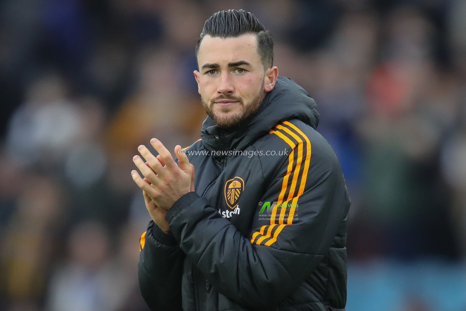 Jack Harrison #11 of Leeds United claps his hands and applauds the supporters at full-time after the Premier League match Leeds United vs Manchester United at Elland Road, Leeds, United Kingdom, 12th February 2023

(Photo by James Heaton/News Images)