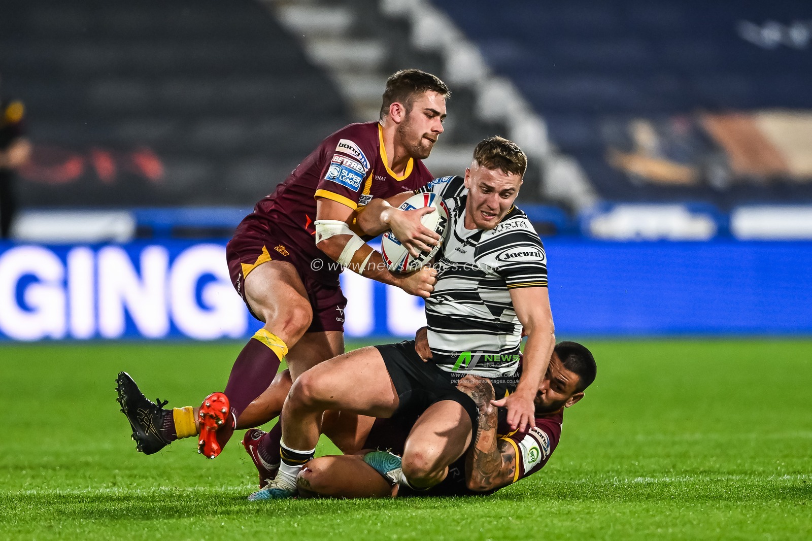 Jake Trueman #6 of Hull FC is tackled by Nathan Peats #9 of Huddersfield Giants during the Betfred Super League Round 20 match Huddersfield Giants vs Hull FC at John Smith's Stadium, Huddersfield, United Kingdom, 27th July 2023

(Photo by Craig Thomas/News Images)