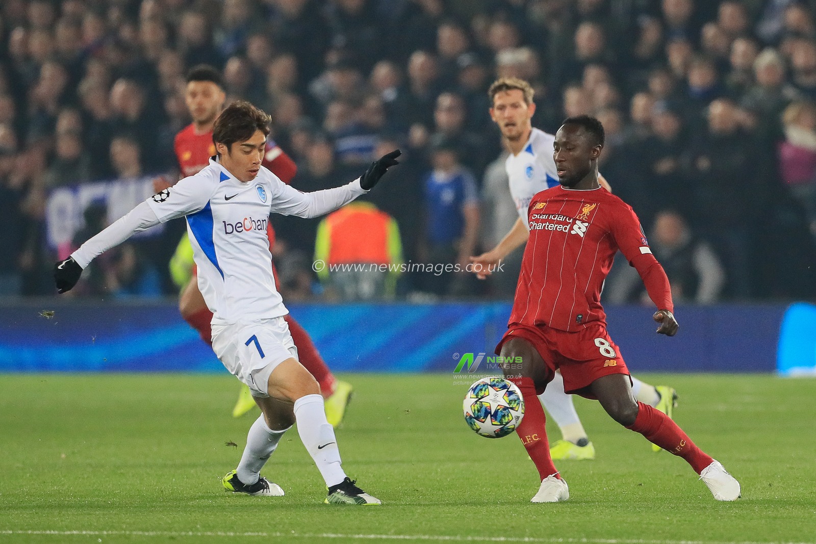 5th November 2019, Anfield, Liverpool, England; UEFA Champions League, Liverpool v KRC Genk : Junya Ito (7) of KRC Genk battles with Naby Keita (8) of Liverpool 

Credit: Mark Cosgrove/News Images