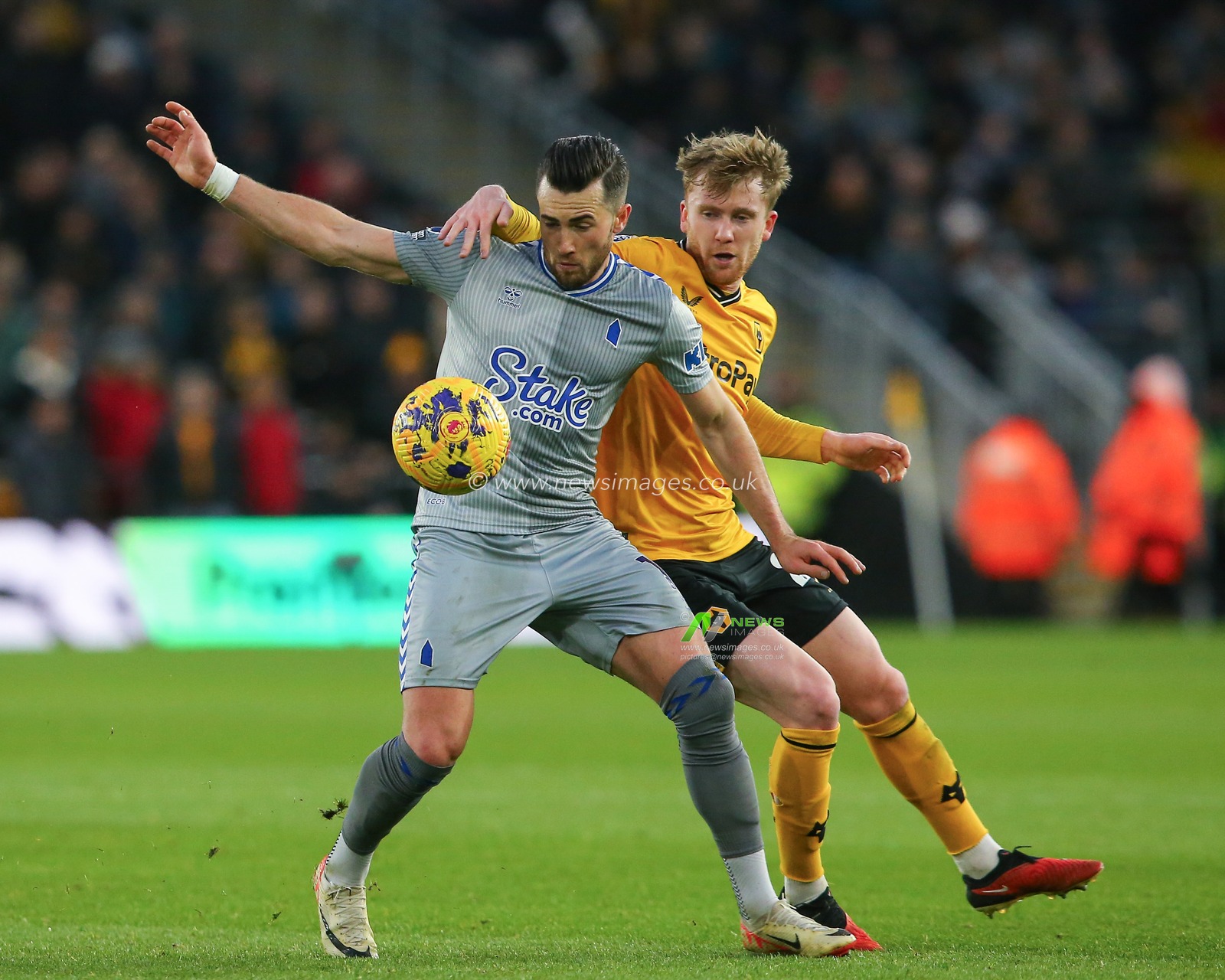 Jack Harrison #11 of Everton is fouled by Tommy Doyle #20 of Wolverhampton Wanderers during the Premier League match Wolverhampton Wanderers vs Everton at Molineux, Wolverhampton, United Kingdom, 30th December 2023

(Photo by Gareth Evans/News Images)