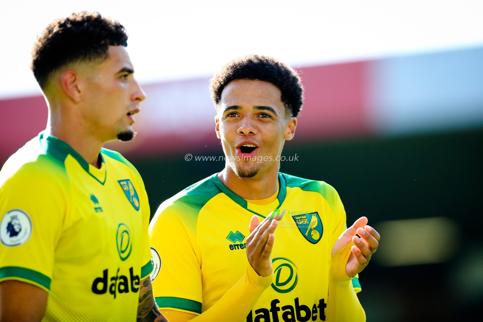 17th August 2019, Carrow Road, Norwich, England ; Premier League Football, Norwich City vs Newcastle United : Jamal Lewis (12) of Norwich City celebrates with Ben Godfrey (04) following their victory



Credit: Georgie Kerr/News Images

English Football League images are subject to DataCo Licence