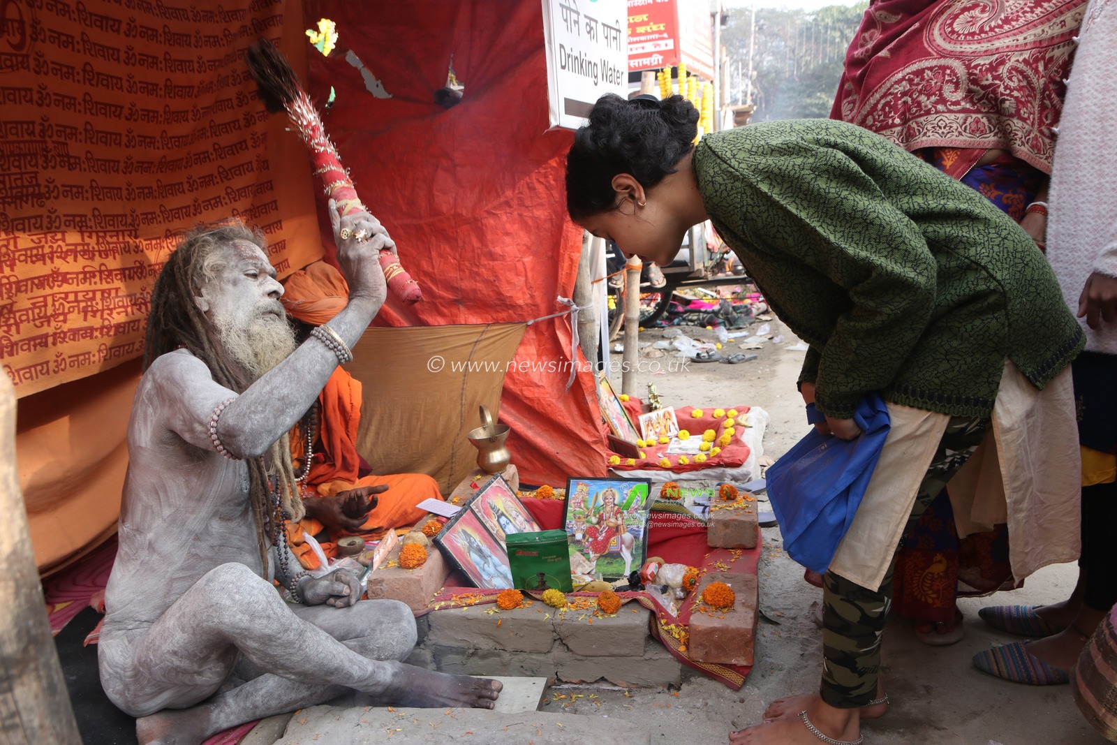 A Naga saint is giving his blessings to pilgrims at a transit camp of the Gangasagar fair in Kolkata, India, on January 11, 2025. The Gangasagar Mela is an annual Hindu festival held at Gangasagar, West Bengal, where the Ganges River meets the Bay of Bengal. The fair takes place at Kapilmuni's ashram on Gangasagar every year on Makar Sankranti.Pictures by Debajyoti Chakraborty(Photo: Debajyoti Chakraborty/News Images)
