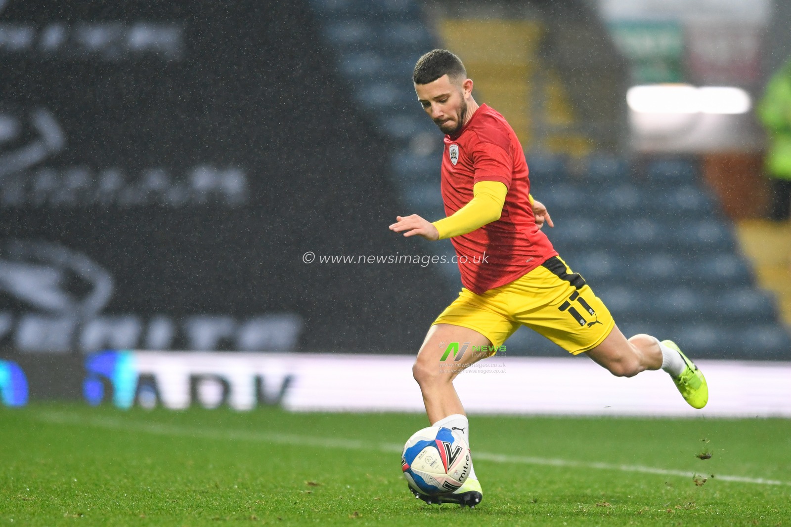 Conor Chaplin #11 of Barnsley warming up before the game