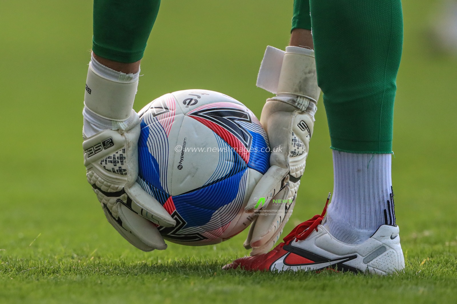 Ben Foster (1) of Watford  picks up todays Sky Bet EFL Mitre Delta Max match ball