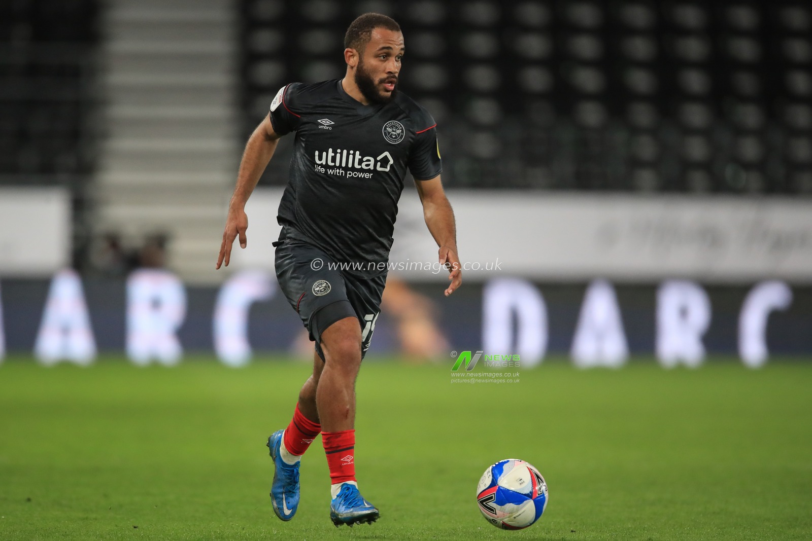 Bryan Mbeumo #19 of Brentford breaks with the ball