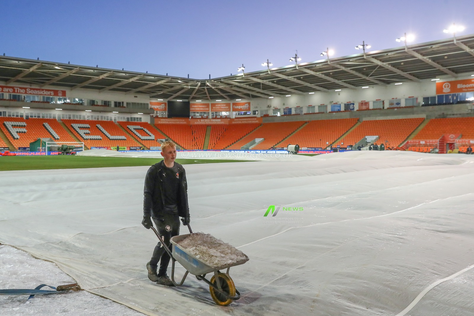Ground staff remove ice off the pitch ahead of the Emirates FA Cup Third Round Replay match Blackpool vs Nottingham Forest at Bloomfield Road, Blackpool, United Kingdom, 17th January 2024

(Photo by Gareth Evans/News Images)