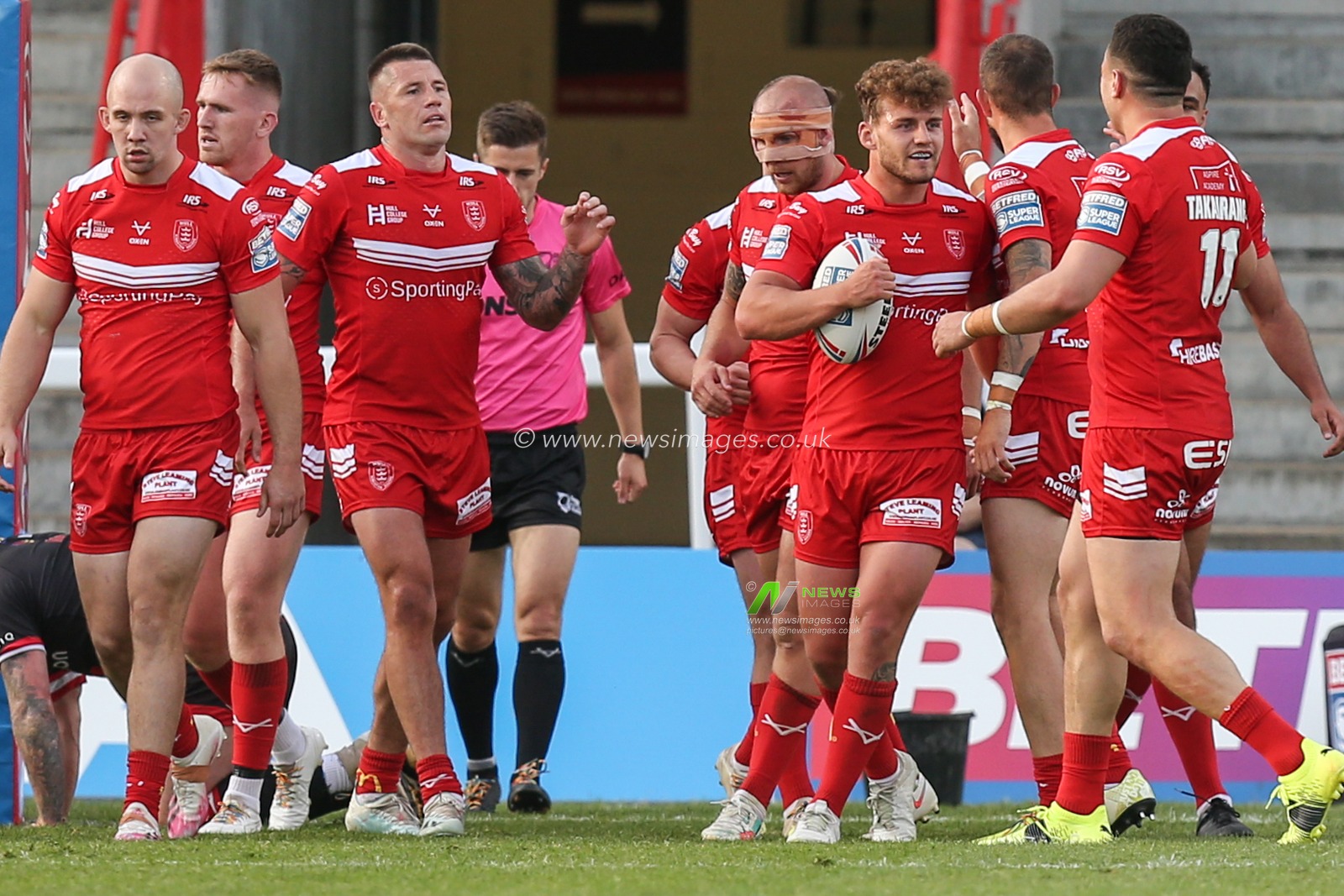 George Lawler (15) of Hull KR celebrates his try