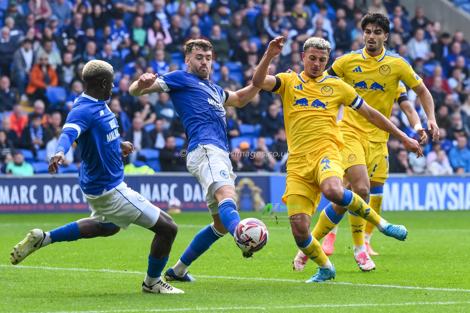 Ethan Ampadu of Leeds United shoots on goal but is blocked by Wilfried Kanga of Cardiff City during the Sky Bet Championship match Cardiff City vs Leeds United at Cardiff City Stadium, Cardiff, United Kingdom, 21st September 2024

(Photo by Craig Thomas/News Images)