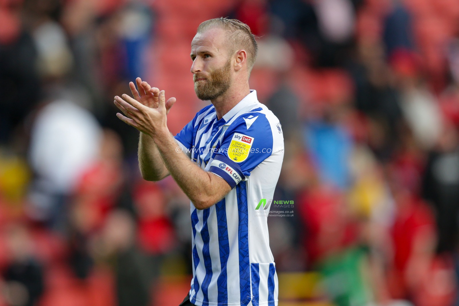 Barry Bannan  #10 of Sheffield Wednesday thanks the travelling fans