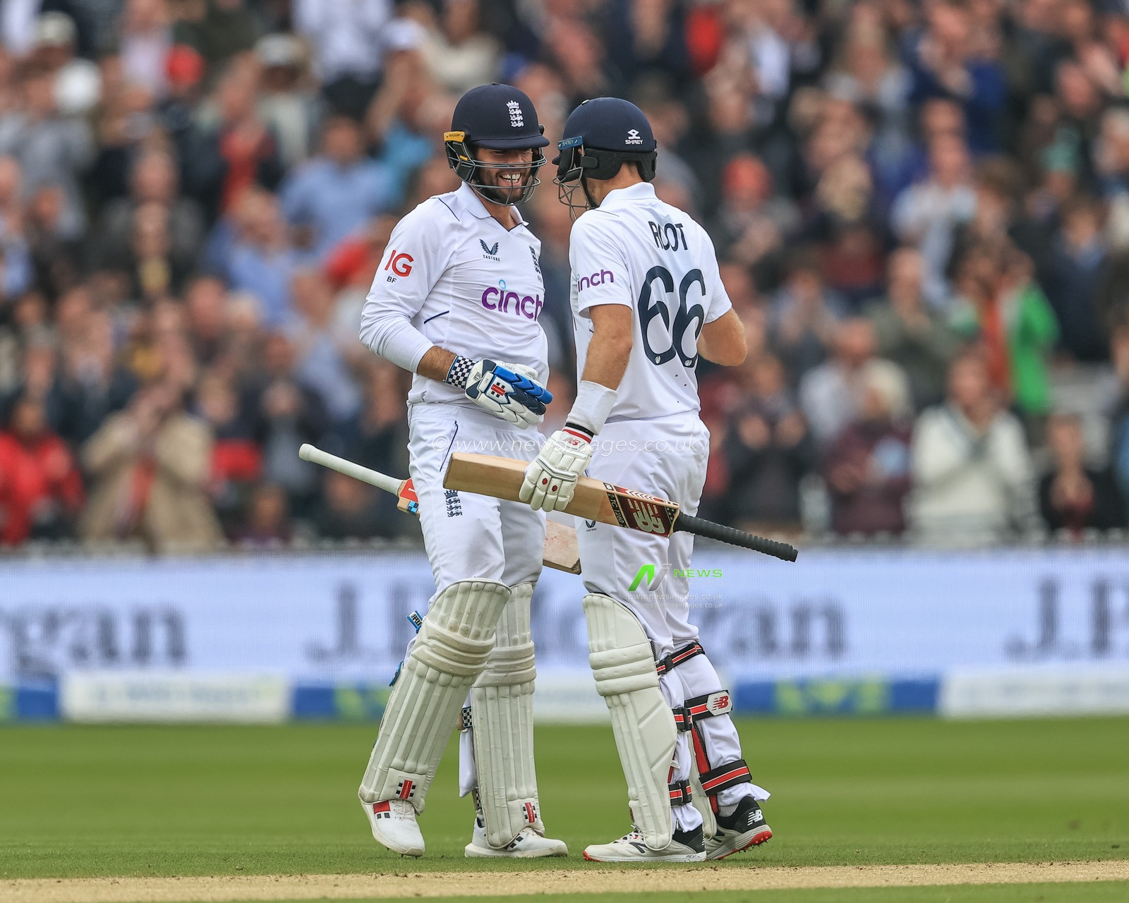 Joe Root of England and Ben Foakes of England celebrate Englandâ€™s test win over New Zealand