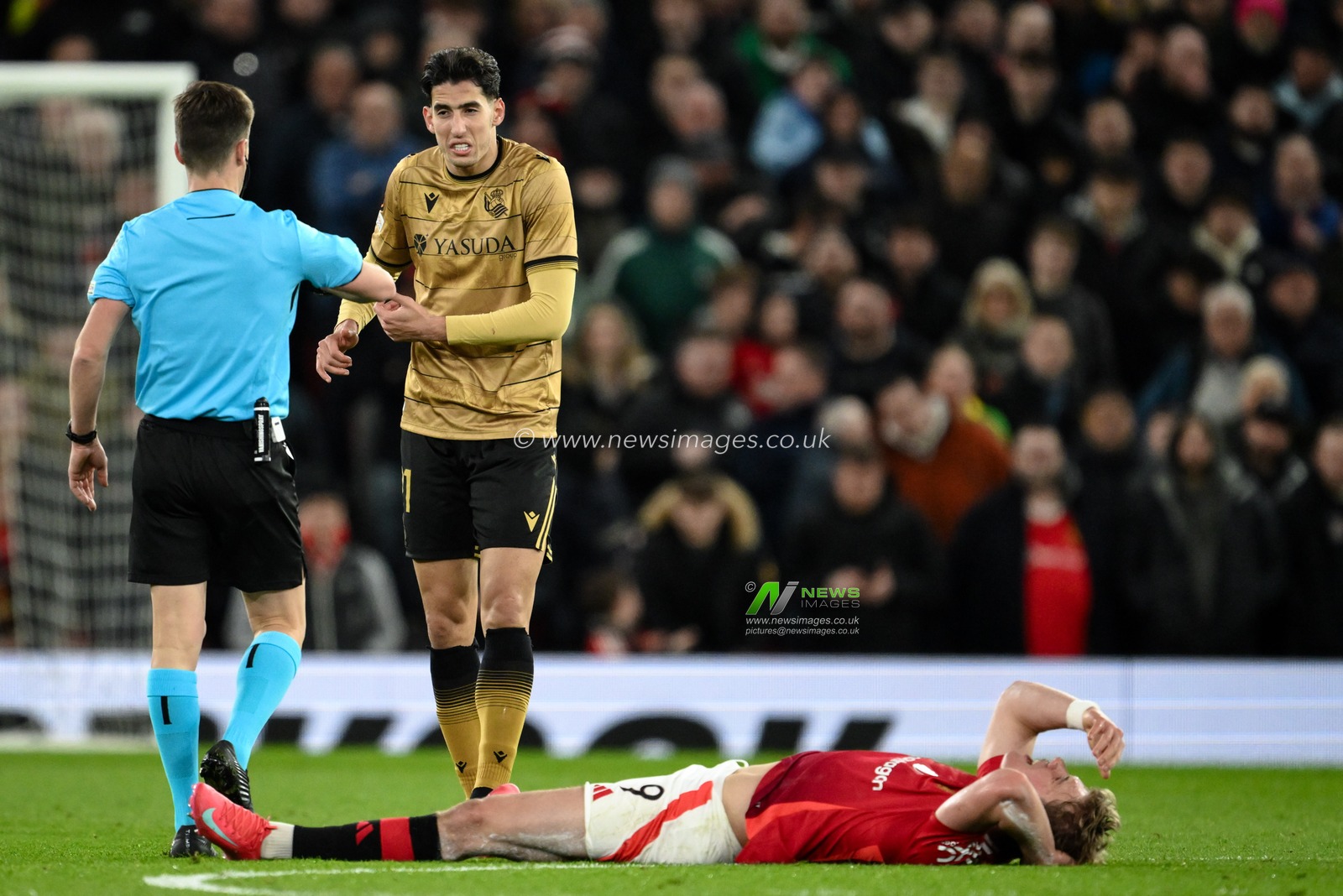 Referee Benoit Bastien speaks to Nayef Aguerd of Real Sociedad after he fouls Rasmus HÃ¸jlund of Manchester United during the UEFA Europa League Last 16 match Manchester United vs Real Sociedad at Old Trafford, Manchester, United Kingdom, 13th March 2025

(Photo by Craig Thomas/News Images)