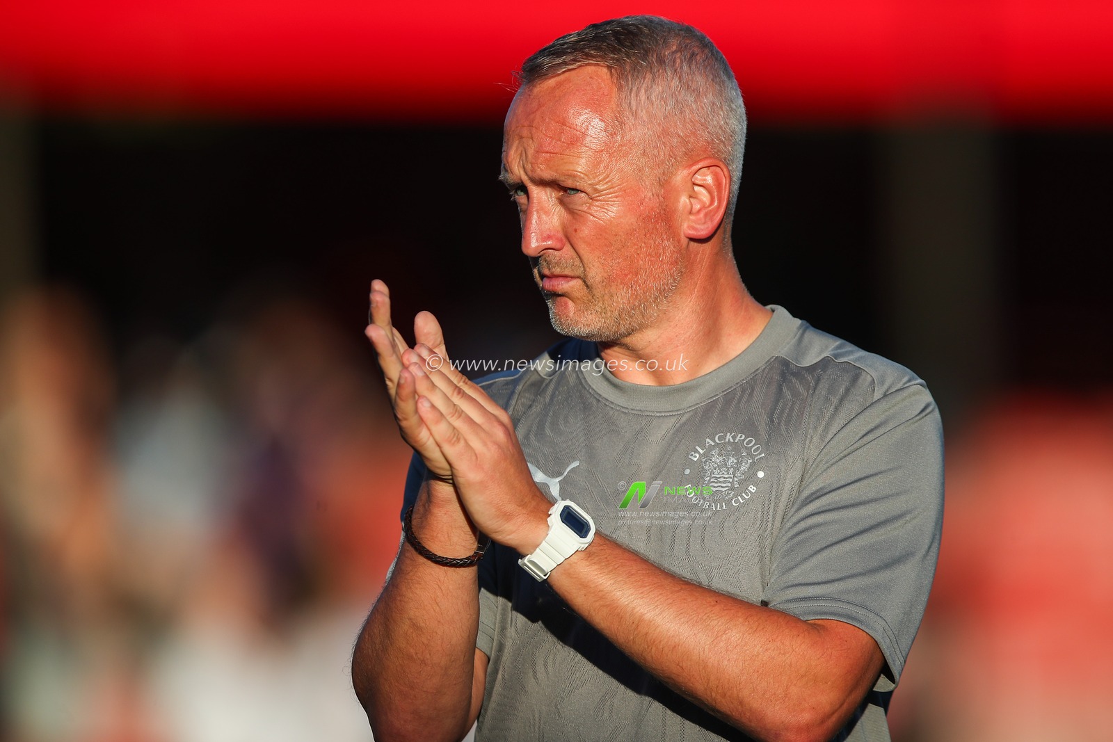 Neil Critchley manager of Blackpool applauds the travelling fans after the Sky Bet League 1 match Crawley Town vs Blackpool at Broadfield Stadium, Crawley, United Kingdom, 10th August 2024

(Photo by Gareth Evans/News Images)