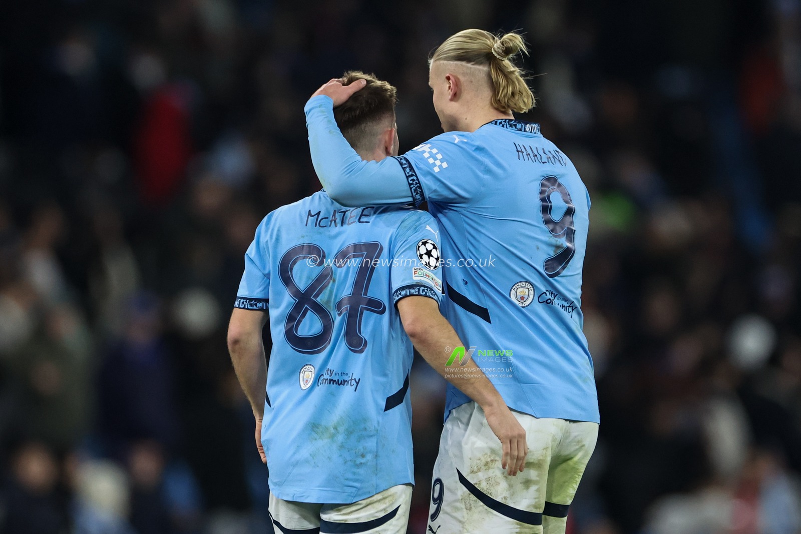 Erling Haaland of Manchester City consoles a dejected James McAtee of Manchester City after the final whistle during the UEFA Champions League match Manchester City vs Feyenoord at Etihad Stadium, Manchester, United Kingdom, 26th November 2024

(Photo by Mark Cosgrove/News Images)