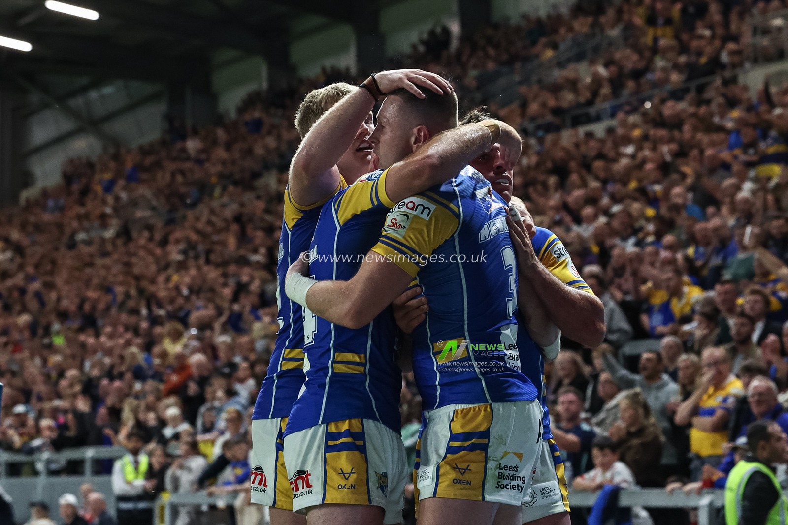 Harry Newman of Leeds Rhinos is congratulated by team mates after storing Joe Burgess of Hull KR from going over in the corner during the Betfred Super League round 23 match Leeds Rhinos vs Hull KR at Headingley Stadium, Leeds, United Kingdom, 21st August 2025

(Photo by Mark Cosgrove/News Images)