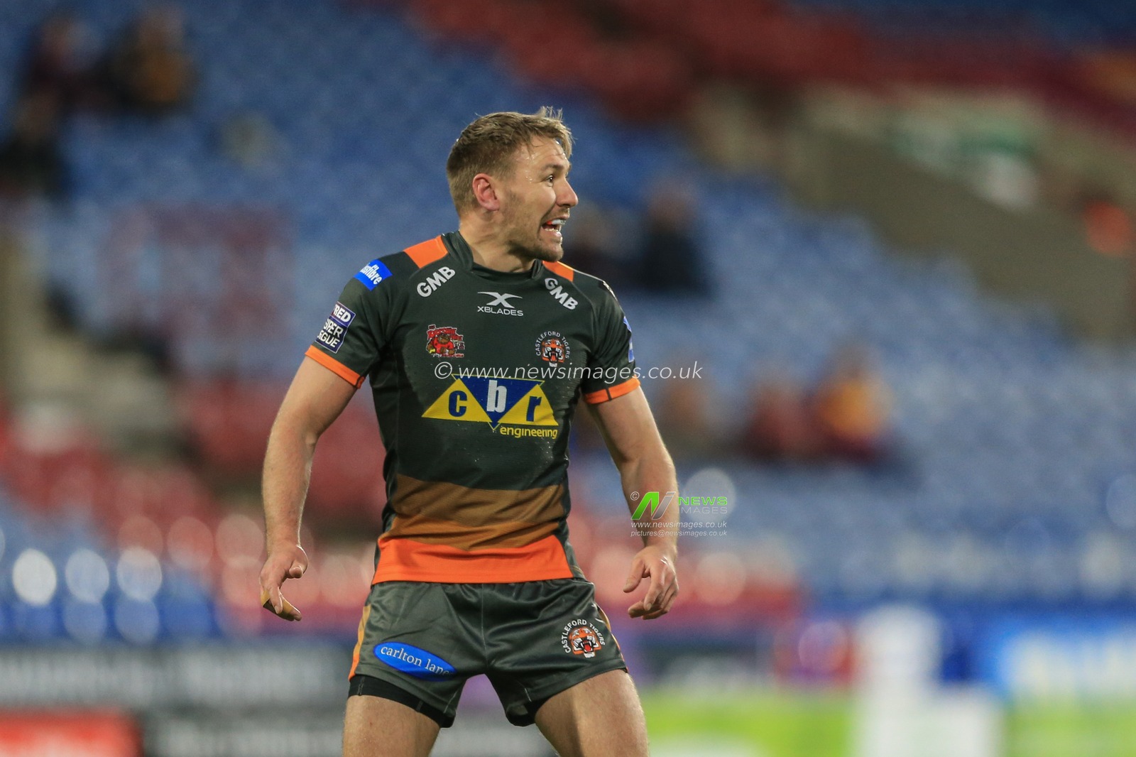 11th April 2019 , John Smiths Stadium, Huddersfield, England; Betfred Super League, Round 10, Huddersfield Giants vs Castleford Tigers ; Greg Eden (5) of Castleford Tigers gives instructions to ream mates 


Credit Mark Cosgrove/News Images