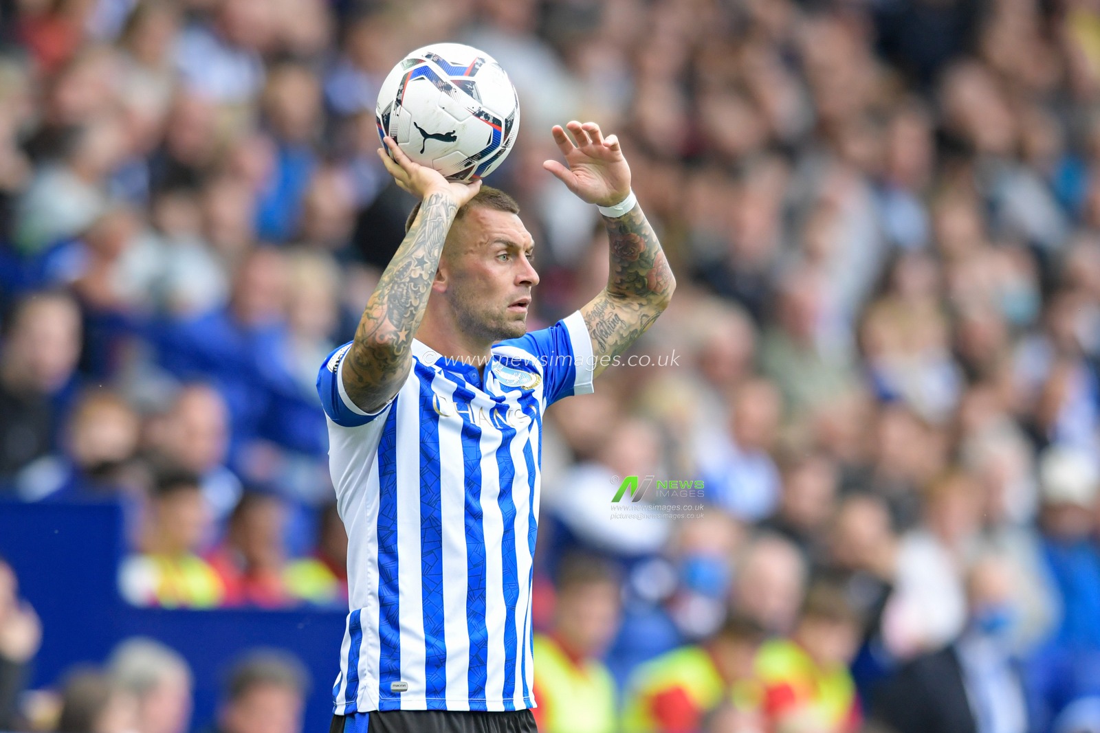 Jack Hunt #32 of Sheffield Wednesday takes a throw in