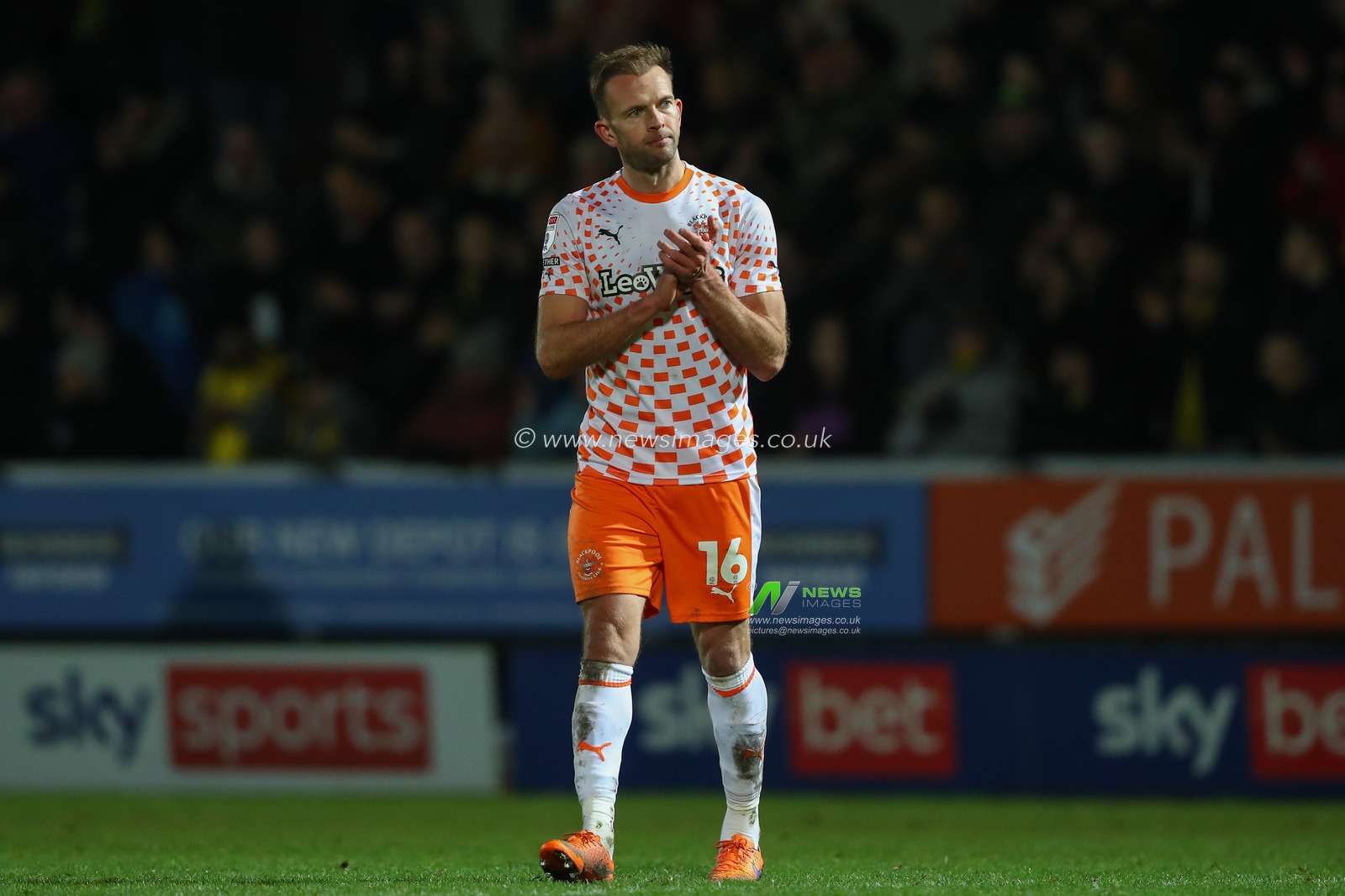 Jordan Rhodes #16 of Blackpool applauds the travelling fans after the Sky Bet League 1 match Burton Albion vs Blackpool at Pirelli Stadium, Burton upon Trent, United Kingdom, 26th December 2023

(Photo by Gareth Evans/News Images)
