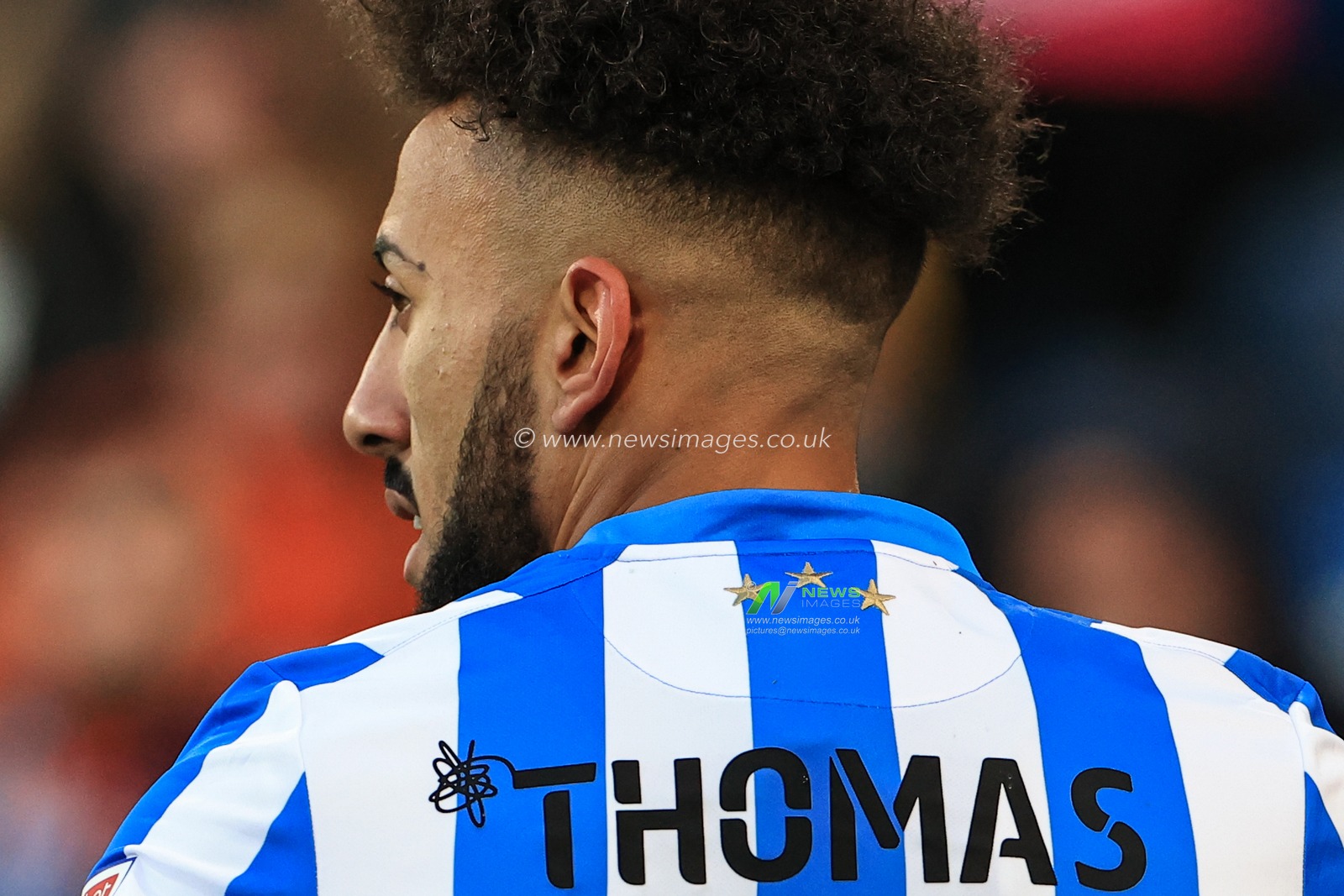 The back of Sorba Thomas #16 of Huddersfield Townâ€™s shirt