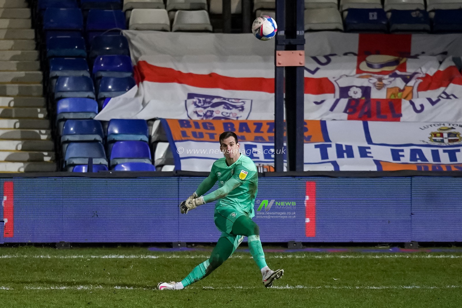 Simon Sluga #12 of Luton Town goal kick