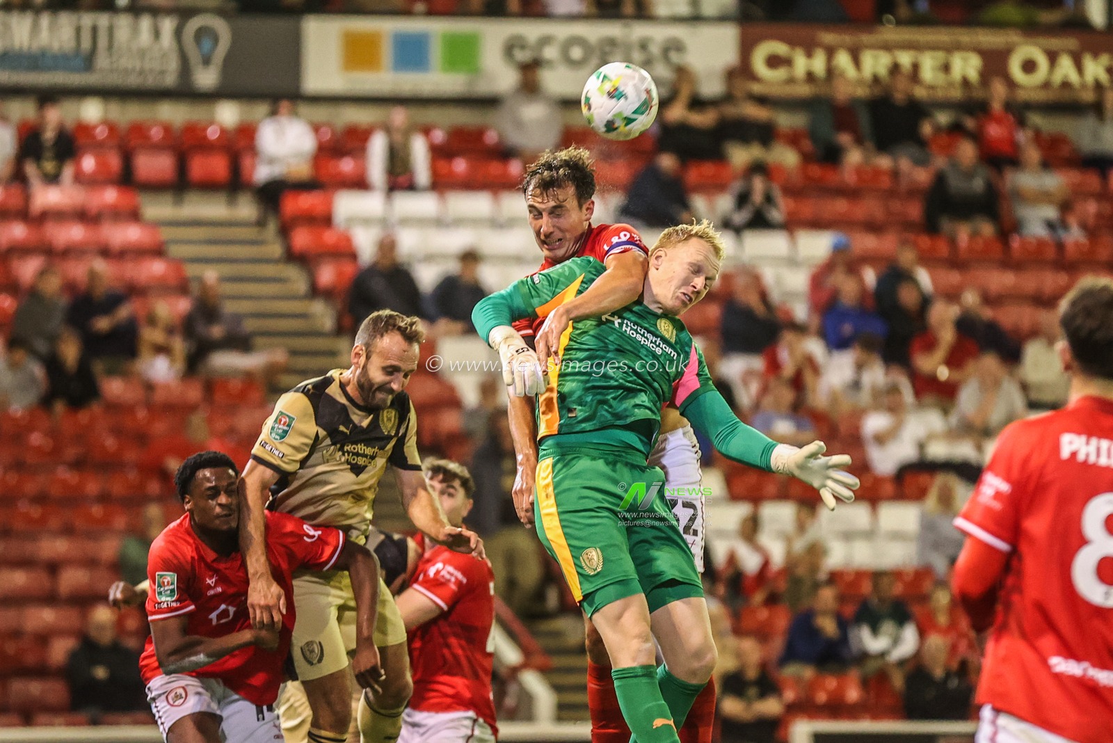 Josh Earl of Barnsley and Cameron Dawson of Rotherham United battle for the ball in the Barnsley box in the final minutes of the game during the Carabao Cup match Barnsley vs Rotherham United at Oakwell, Barnsley, United Kingdom, 26th August 2025

(Photo by Alfie Cosgrove/News Images)