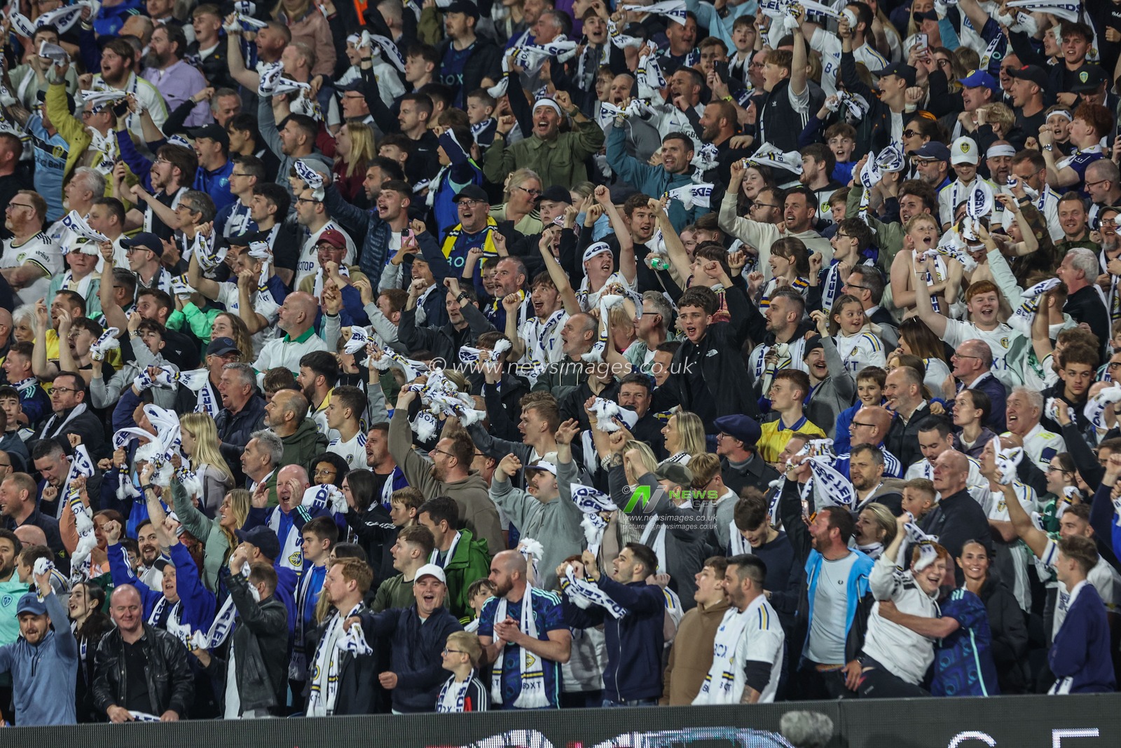 Leeds fans celebrate as they are 4-0 up during the Sky Bet Championship Play-off Semi Final Second Leg Leeds United vs Norwich City at Elland Road, Leeds, United Kingdom, 16th May 2024

(Photo by Mark Cosgrove/News Images)