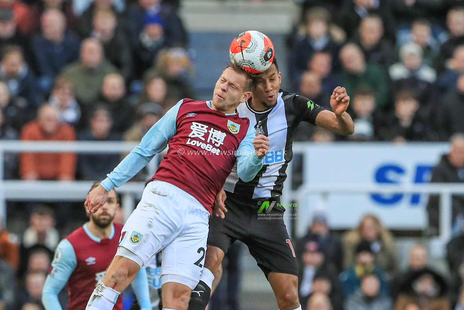 29th February 2020, St. James's Park, Newcastle, England; Premier League, Newcastle United v Burnley : MatÄ›j Vydra (27) of Burnley and Isaac Hayden (14) of Newcastle United dual for the ball