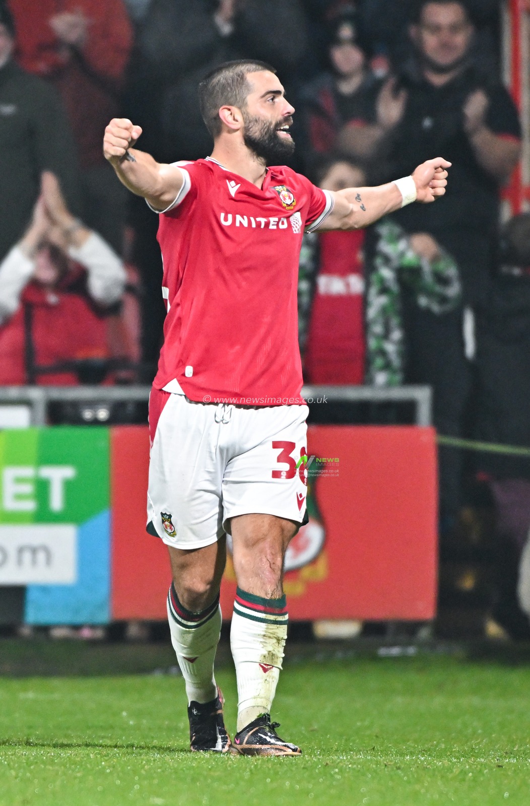 Elliot Lee 38# of Wrexham Association Football Club celebrates his late match winning goal, during the Sky Bet League 2 match Wrexham vs Sutton United at SToK Cae Ras, Wrexham, United Kingdom, 24th October 2023

(Photo by Cody Froggatt/News Images)