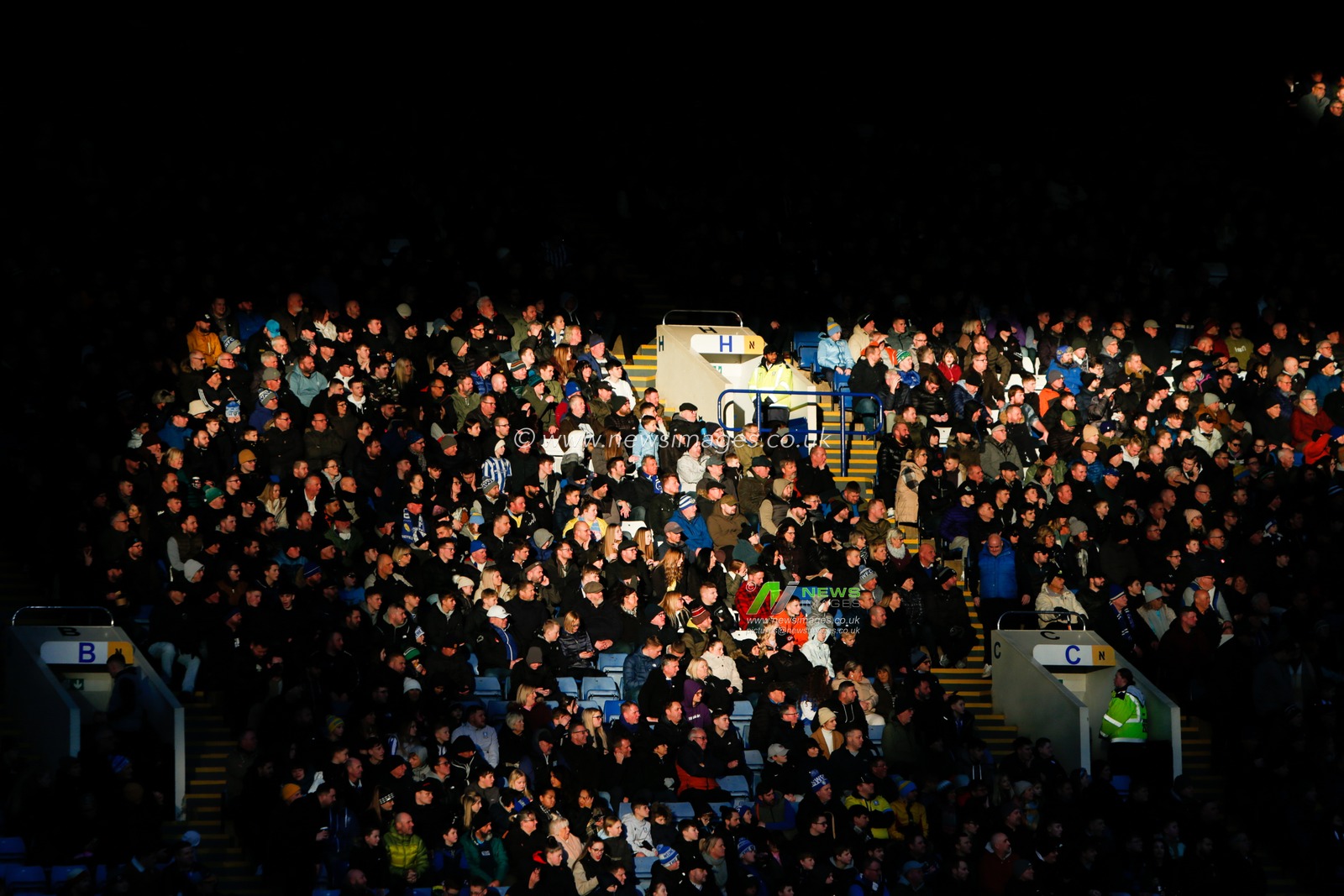 Fans of Sheffield Wednesday watch on during the Sky Bet League 1 match Sheffield Wednesday vs Cambridge United at Hillsborough, Sheffield, United Kingdom, 2nd January 2023

(Photo by Ben Early/News Images)