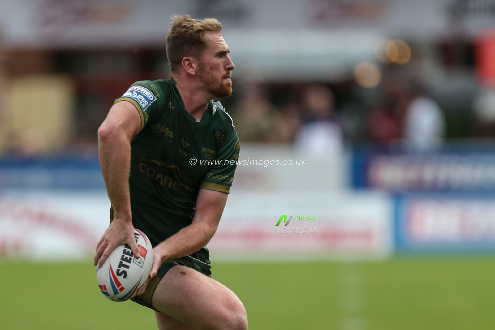 Rowan Milnes #21 of Hull KR in action during the game