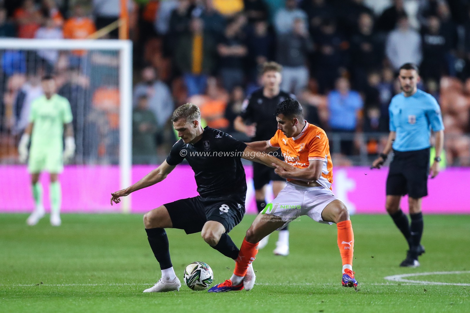 Svante Ingelsson of Sheffield Wednesday holds off Albie Morgan of Blackpool during the Carabao Cup match Blackpool vs Sheffield Wednesday at Bloomfield Road, Blackpool, United Kingdom, 17th September 2024

(Photo by Gareth Evans/News Images)