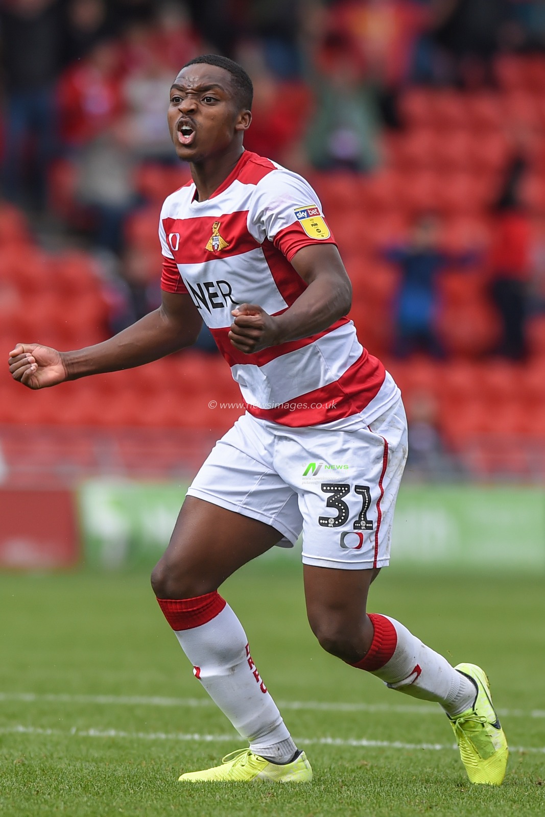 7th September 2019, Keepmoat Stadium, Doncaster, England; Sky Bet League One Football, Doncaster Rovers vs Rotherham United ; Niall Ennis (31) of Doncaster Rovers of celebrates winnning a penalty.
Credit: Dean Williams/News Images

English Football League images are subject to DataCo Licence
