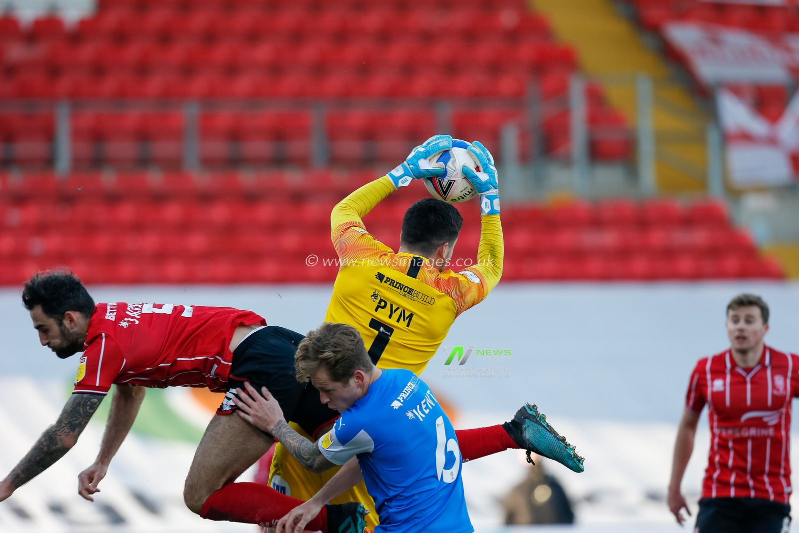 Christy Pym #1 of Peterborough United saves the ball