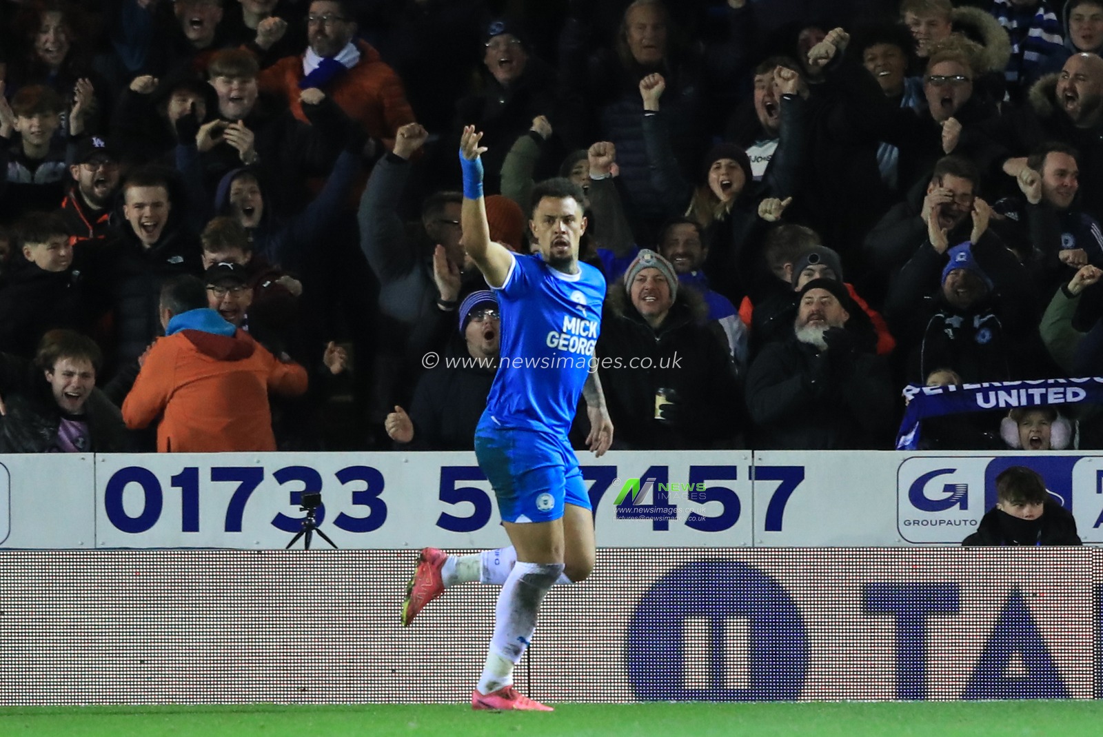 Jonson Clarke-Harris #9 of Peterborough United celebrates his goal to make it 2-2 during the Sky Bet League 1 match Peterborough United vs Barnsley at Weston Homes Stadium, Peterborough, United Kingdom, 29th December 2023

(Photo by Alfie Cosgrove/News Images)