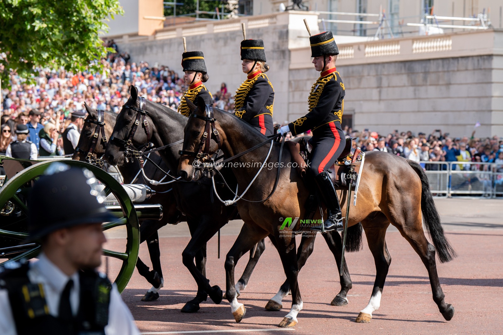 Solders take part in the parade down the mall before and after Trooping the Colour at Horse Guards Parade