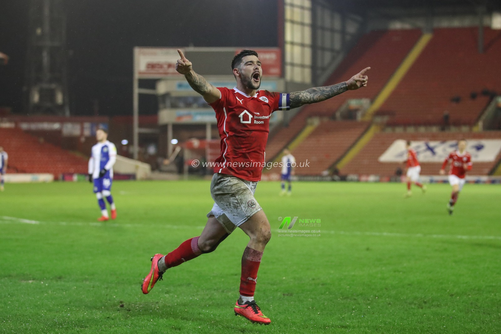 Alex Mowatt #27 of Barnsley celebrates his goal to make it 2-0