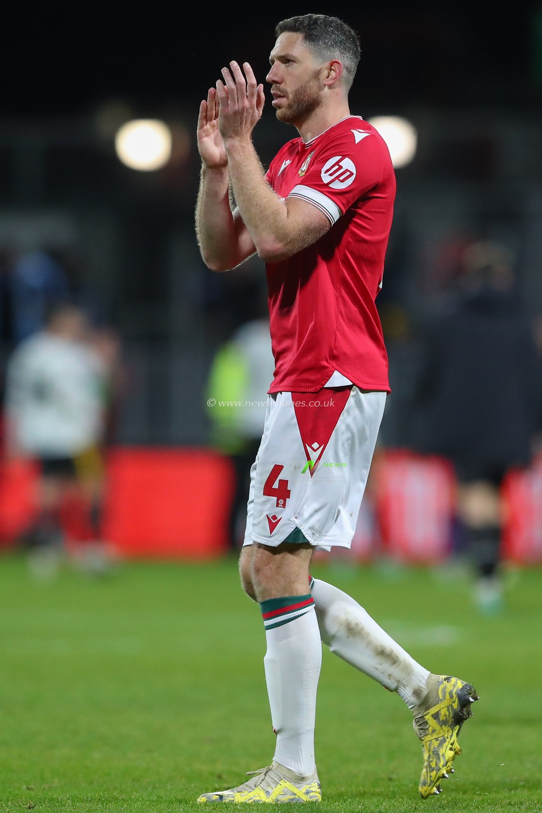 Ben Tozer #4 of Wrexham applauds the home fans after the Sky Bet League 2 match Wrexham vs Newport County at SToK Cae Ras, Wrexham, United Kingdom, 23rd December 2023

(Photo by Gareth Evans/News Images)