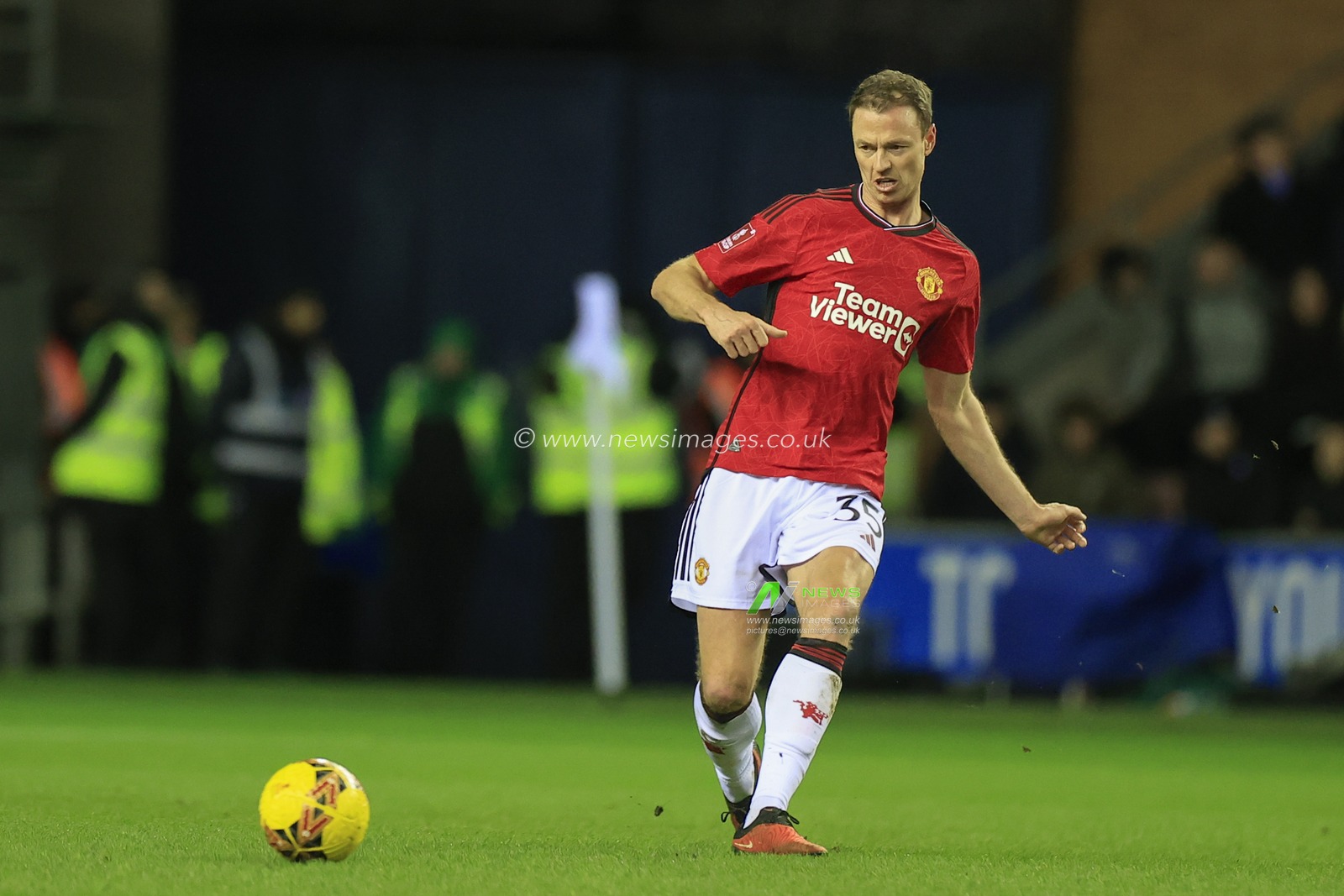 Jonny Evans of Manchester United passes the ball during the Emirates FA Cup Third Round match Wigan Athletic vs Manchester United at DW Stadium, Wigan, United Kingdom, 8th January 2024

(Photo by Conor Molloy/News Images)