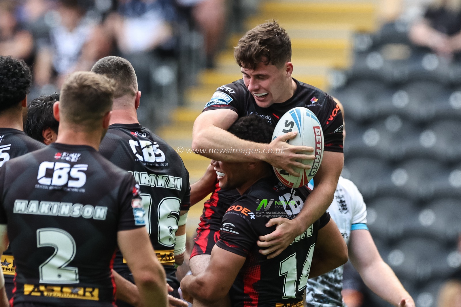 Jake Burns of St. Helens celebrates their try during the Betfred Super League Round 20 match Hull FC vs St Helens at MKM Stadium, Hull, United Kingdom, 3rd August 2024

(Photo by Mark Cosgrove/News Images)