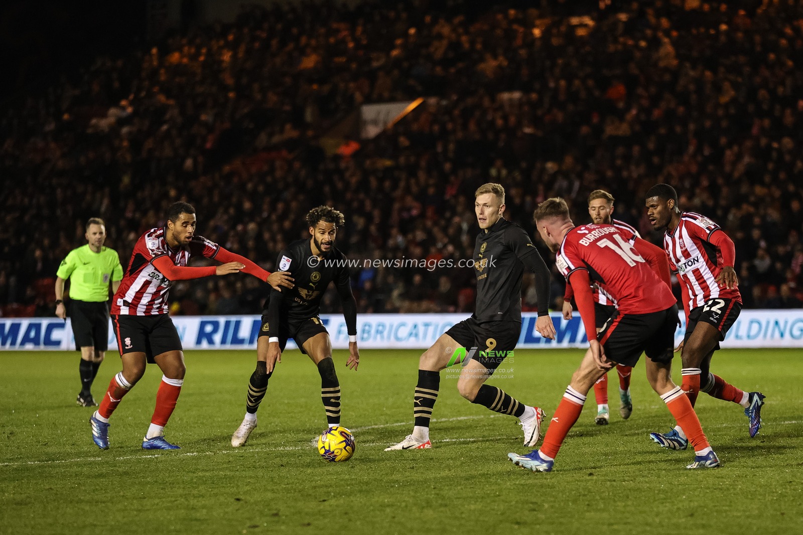 Sam Cosgrove #9 of Barnsley in action during the Sky Bet League 1 match Lincoln City vs Barnsley at Gelder Group Sincil Bank Stadium, Lincoln, United Kingdom, 25th November 2023

(Photo by Mark Cosgrove/News Images)