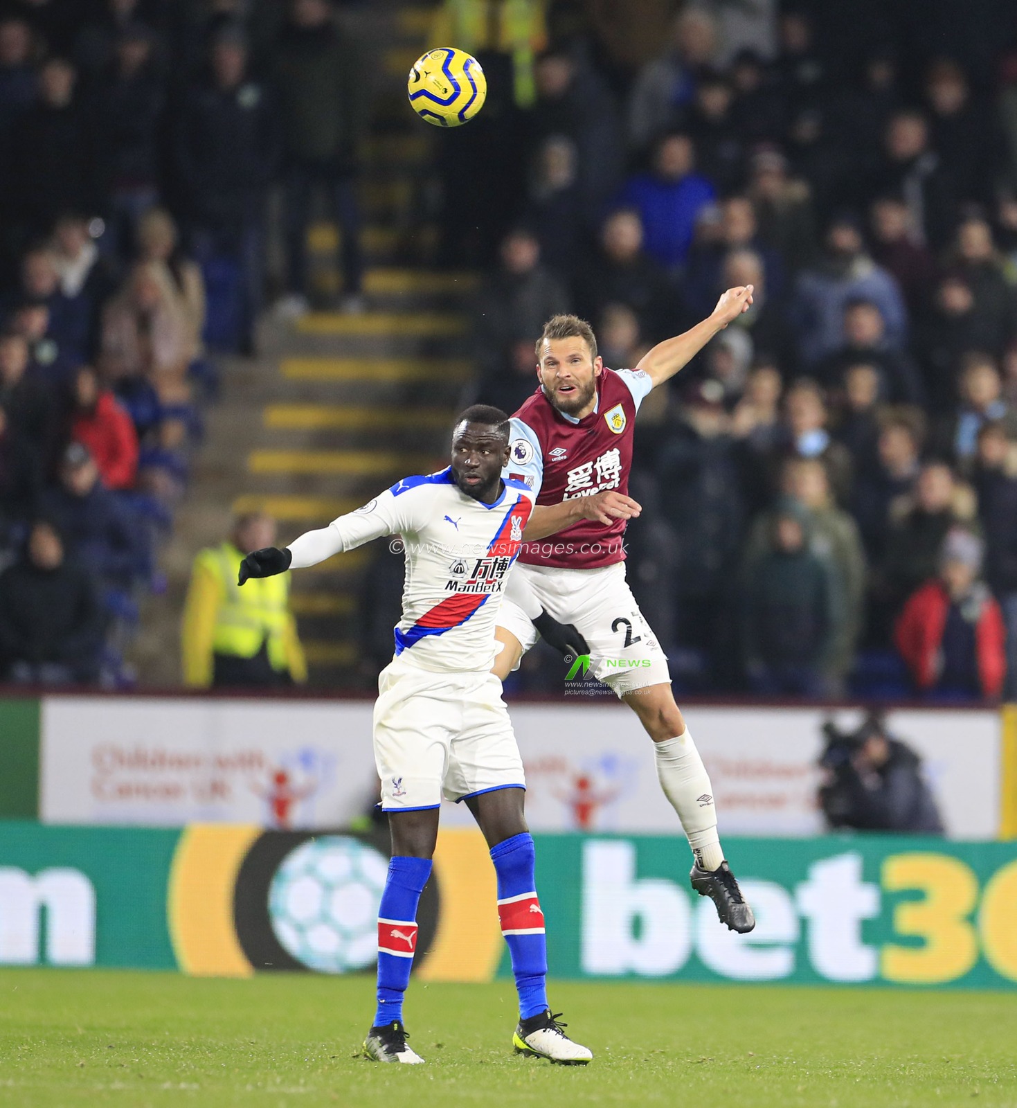 30th November 2019, Turf Moor, Burnley, England; Premier League, Burnley v Crystal Palace : Erik Pieters (23) of Burnley wins the header against Cheikhou Kouyate (8) of Crystal Palace

Credit: Conor Molloy/News Images