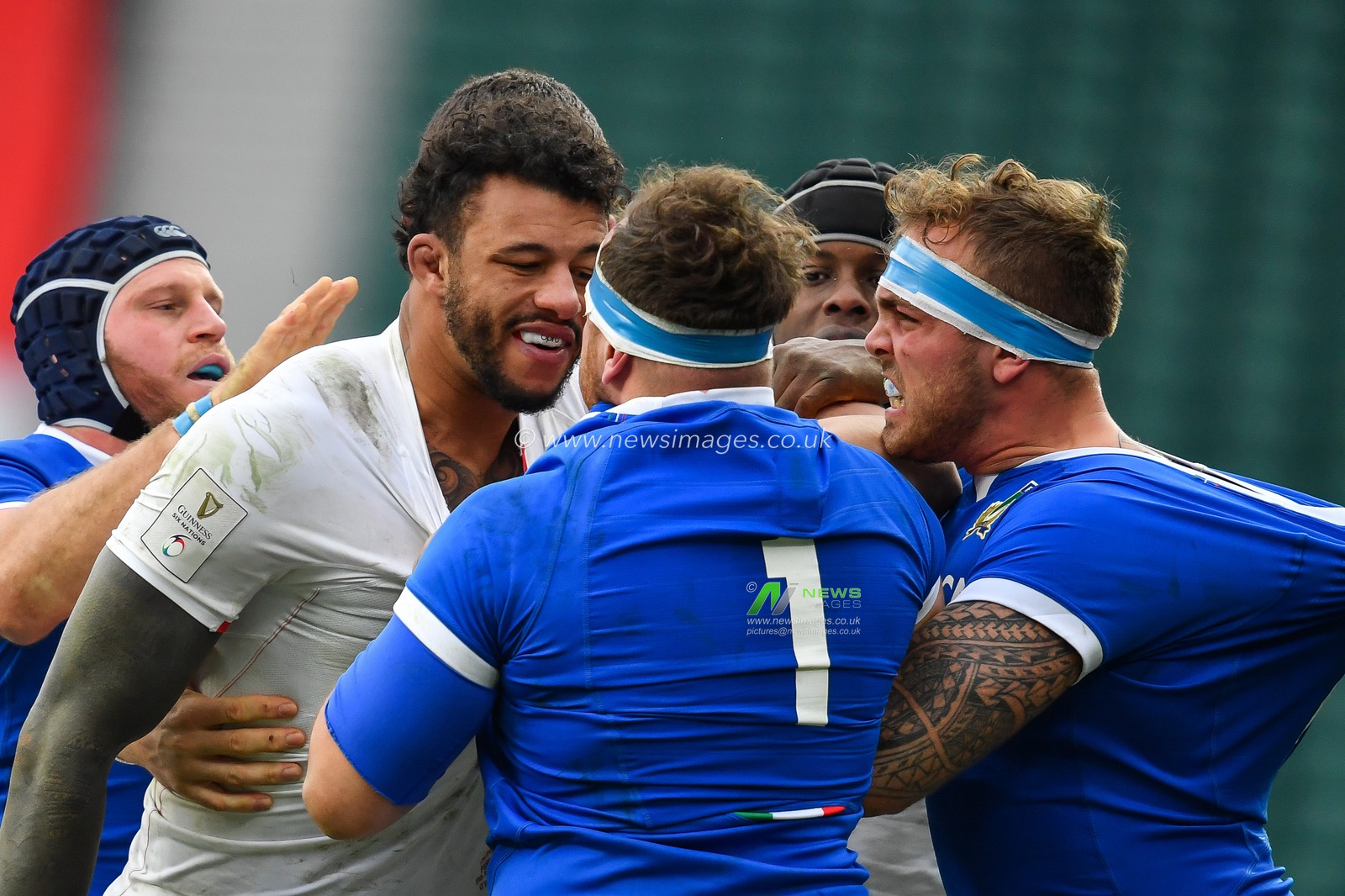 Andrea Lovotti of Italy faces off with Courtney Lawes of England