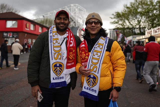 Fans make their way to the game wearing Manchester United v Leeds United scarfs during the Premier League match Manchester United vs Leeds United at Old Trafford, Manchester, United Kingdom on 13 April 2026

(Photo by Mark Cosgrove/News Images)