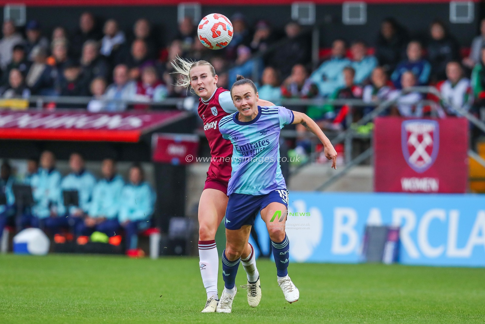 Shannon Cooke of West Ham United battles for the ball with Caitlin Foord of Arsenal during the Barclays Women's Super League match West Ham United Women vs Arsenal Women at Chigwell Construction Stadium, Dagenham, United Kingdom, 20th October 2024

(Photo by Izzy Poles/News Images)