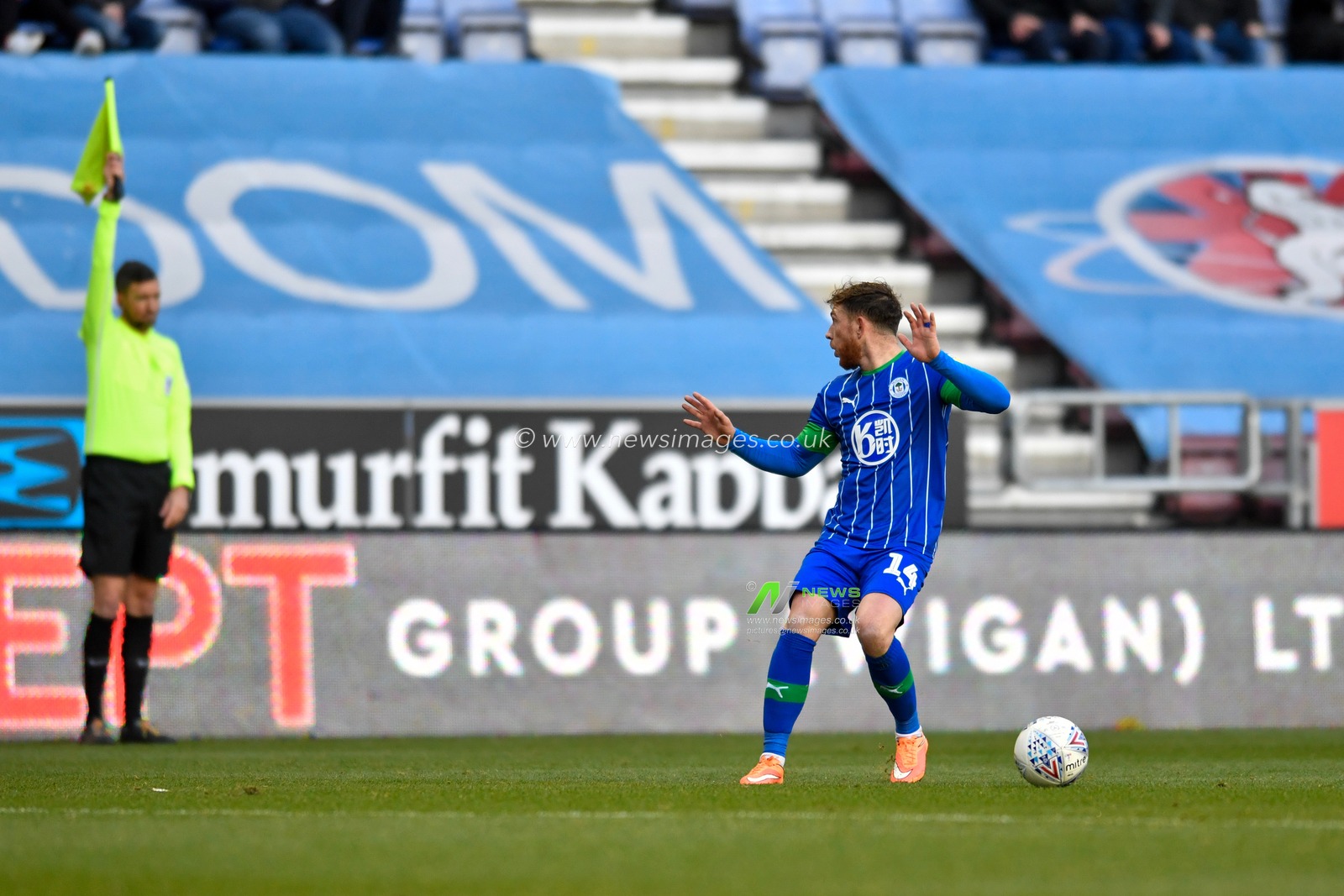 30th November 2019, DW Stadium, Wigan, England; Sky Bet Championship, Wigan Athletic v Reading : Joe Garner (14) of Wigan Athletic is caught offside

Credit: Simon Whitehead/News Images