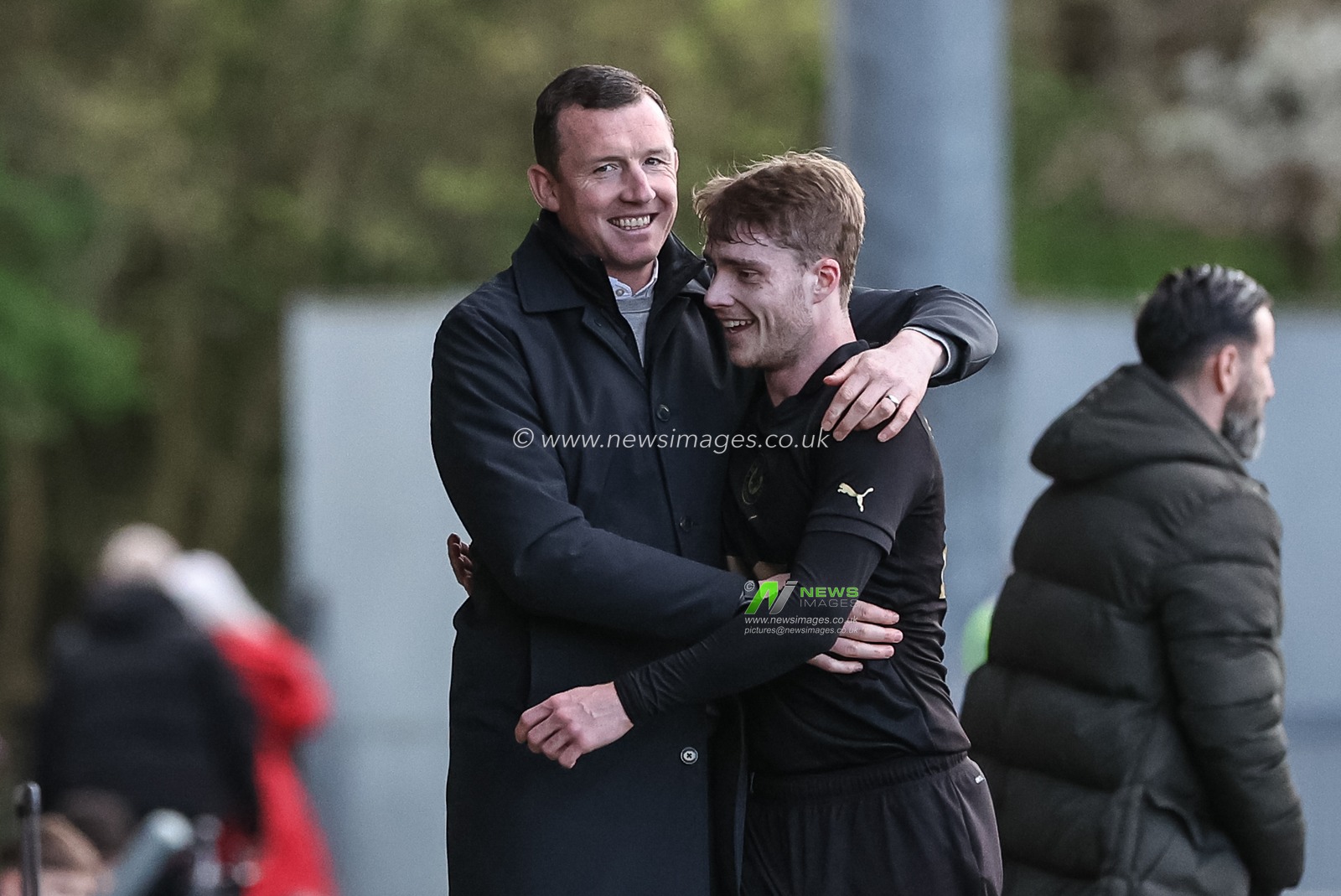 Neill Collins Head coach of Barnsley embraces Luca Connell of Barnsley after heâ€™s substituted during the Sky Bet League 1 match Burton Albion vs Barnsley at Pirelli Stadium, Burton upon Trent, United Kingdom, 1st April 2024

(Photo by Mark Cosgrove/News Images)