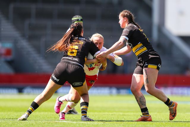 Jodie Cunningham of St Helens is tackled during the Betfred Women's Challenge Cup Semi-final match St Helens vs York City Knights at Totally Wicked Stadium, St Helens, United Kingdom, 11th May 2025

(Photo by Gareth Evans/News Images)
