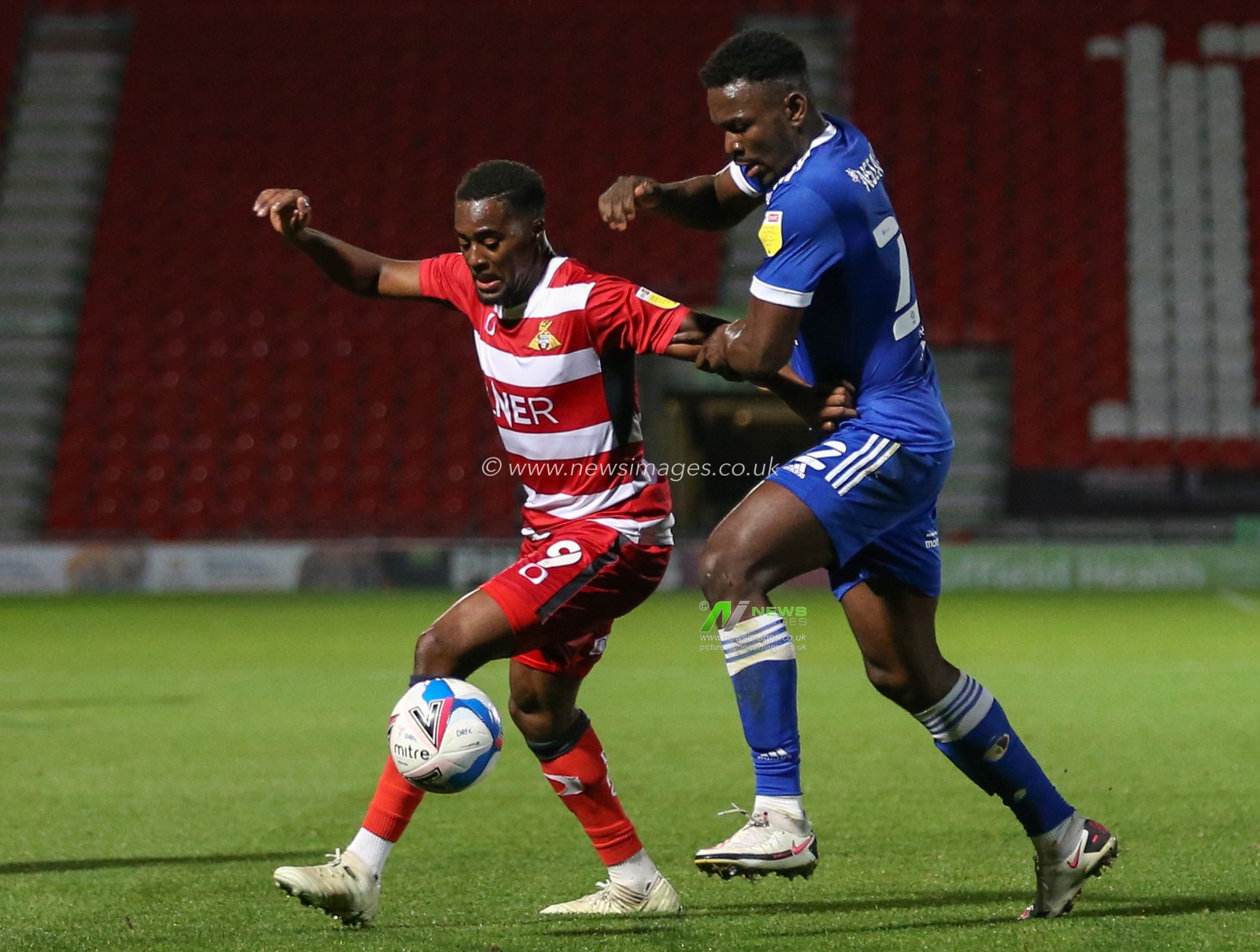 Fejiri Okenabirhie (9) of Doncaster Rovers in action during the game