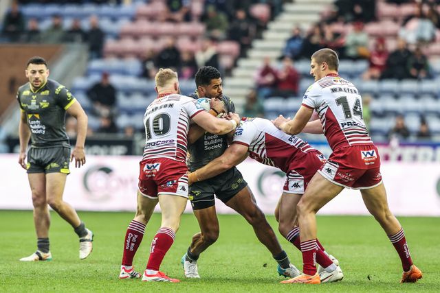 Kallum Watkins of Leeds Rhinos is tackled by Ethan Havard of Wigan Warriors during the Betfred Super League round 11 match Wigan Warriors vs Leeds Rhinos at The Brick Community Stadium, Wigan, United Kingdom on 15 May 2026

(Photo by Alfie Cosgrove/News Images)
